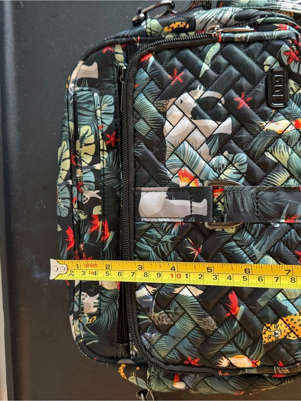 lug Quilted Crossbody Bag in Black with Green and Red Tropical Print